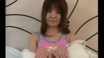 Naked Japanese babe's wild webcam romp with a lustful pup