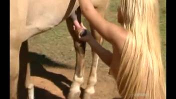 Sexy blond stuns in genuine outdoor bestiality erotica