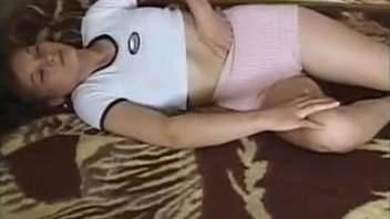 Pigtail girl with ample breasts passionately services a semen-filled canine penis with affection