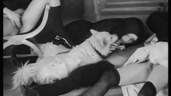 Vintage animal sex video featuring sapphic nuns and a canine