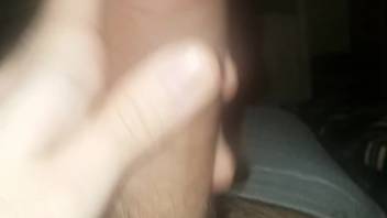 Guy lets his dog approach and lick his dick