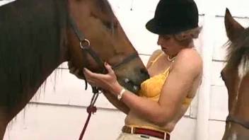 Lustful cowgirl desires to tempt two stallions simultaneously