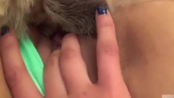 Ginger-haired chick presenting her opening to a hot pooch