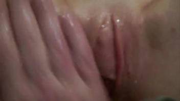 Intense bestiality adult film showing a lady getting fisted in her vagina