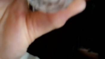Guy chugs a cup brimming with warm beast cum