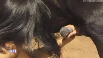 Intense outdoor bestiality with a naked Latina chick sporting a fine booty